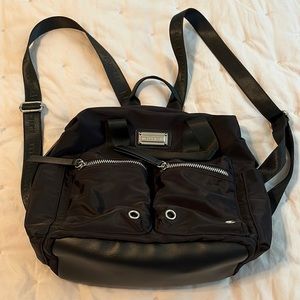 Madden Girl small black backpack.